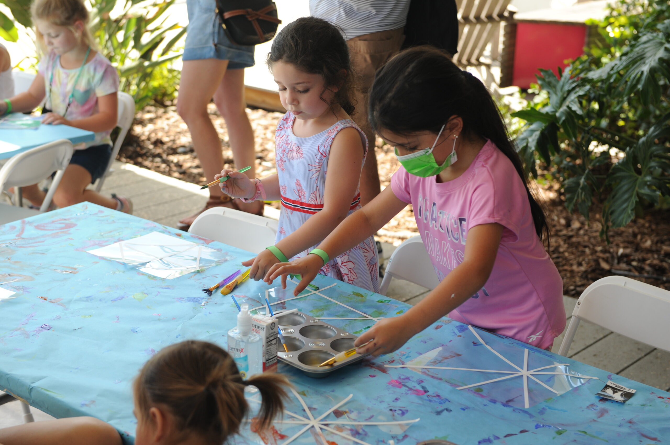 Children painting and making crafts